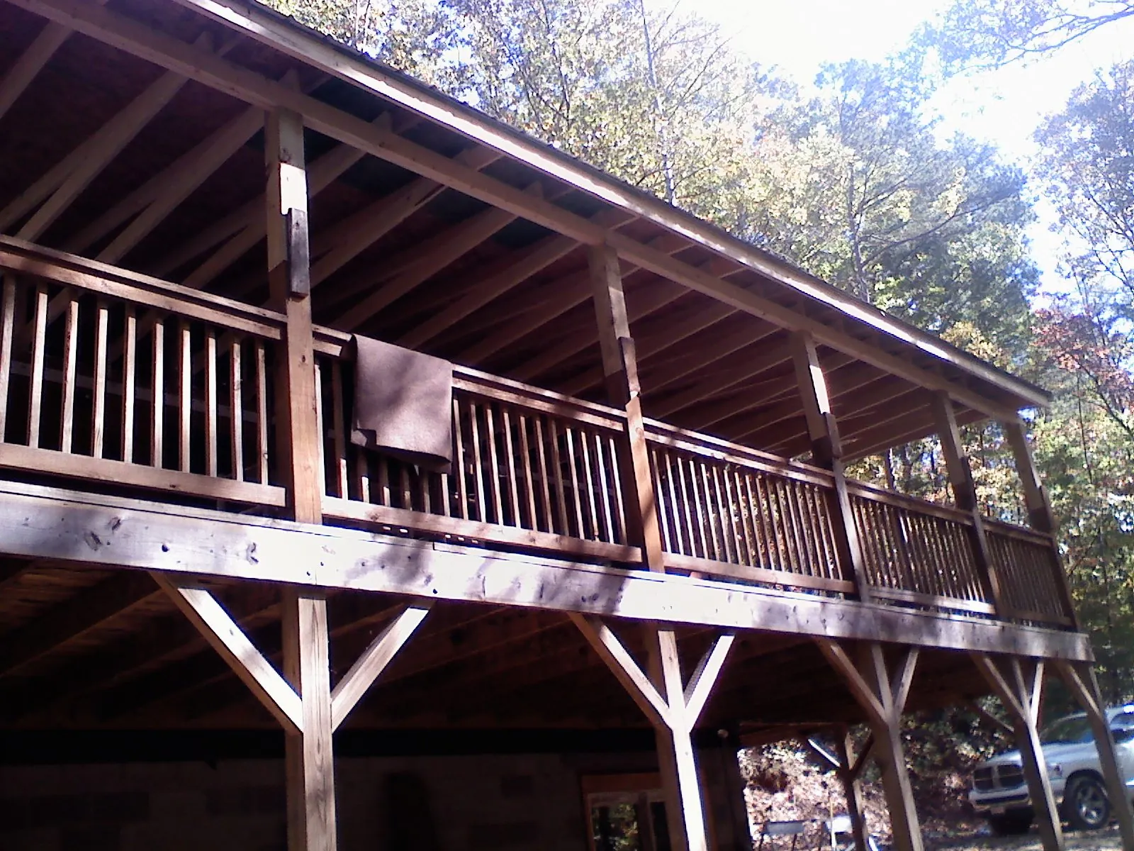 Timber framing under a new elevated porch and deck — Roof Leak Repair in Kohler by Roofing Brothers